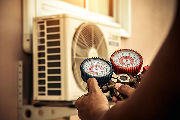 Professional Hvac technician working in Huntsville, MO